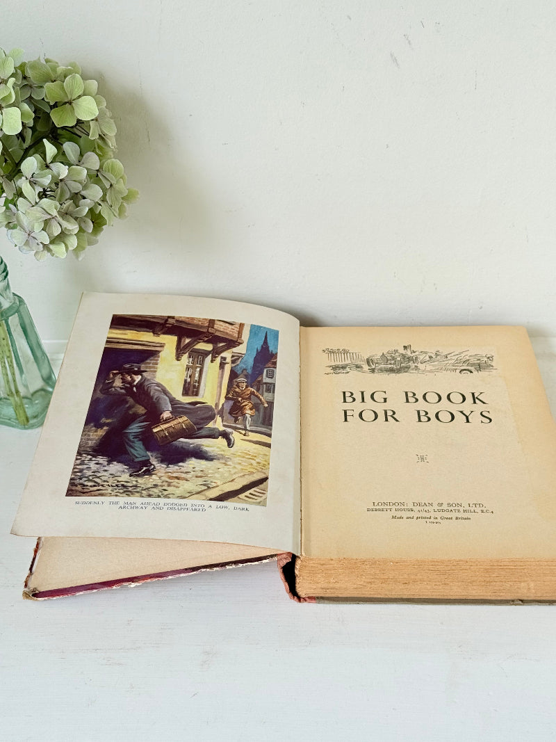 Vintage Big Book for Boys annual with illustrated cover and inscription dated 1941, photographed on a white surface