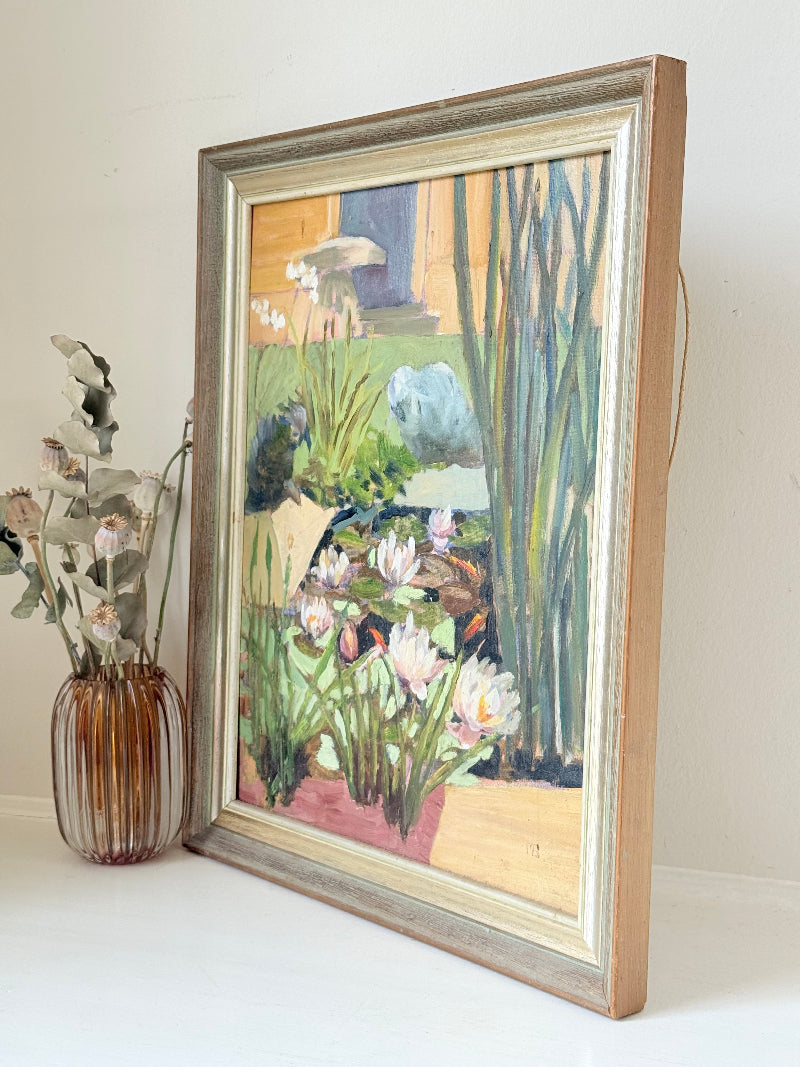 Vintage oil on board painting of waterlilies on a pond by Muriel Hester Broughton (1904–2003), monogrammed MB, framed in silver wood, photographed on a white surface