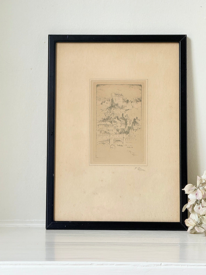 framed print of windsor castle viewed from the thames with fine line detail photographed on white surface