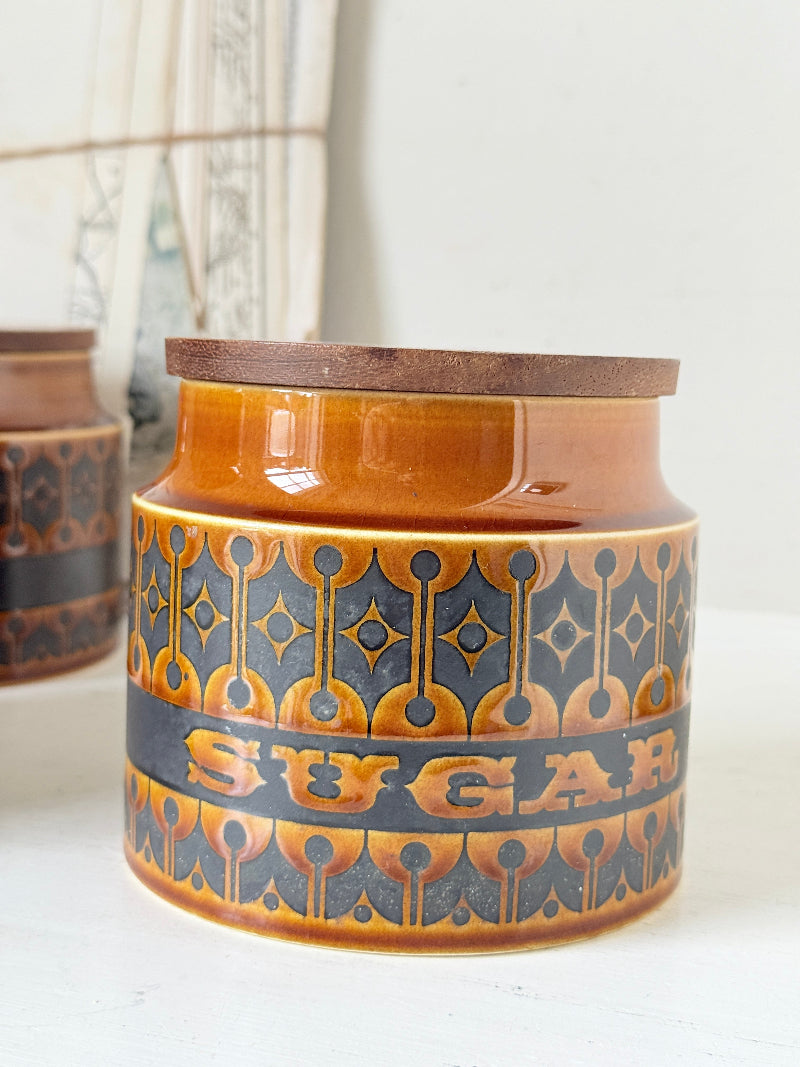 Hornsea Heirloom coffee tea and sugar canister set in autumn brown stoneware with teak lids photographed on a white surface