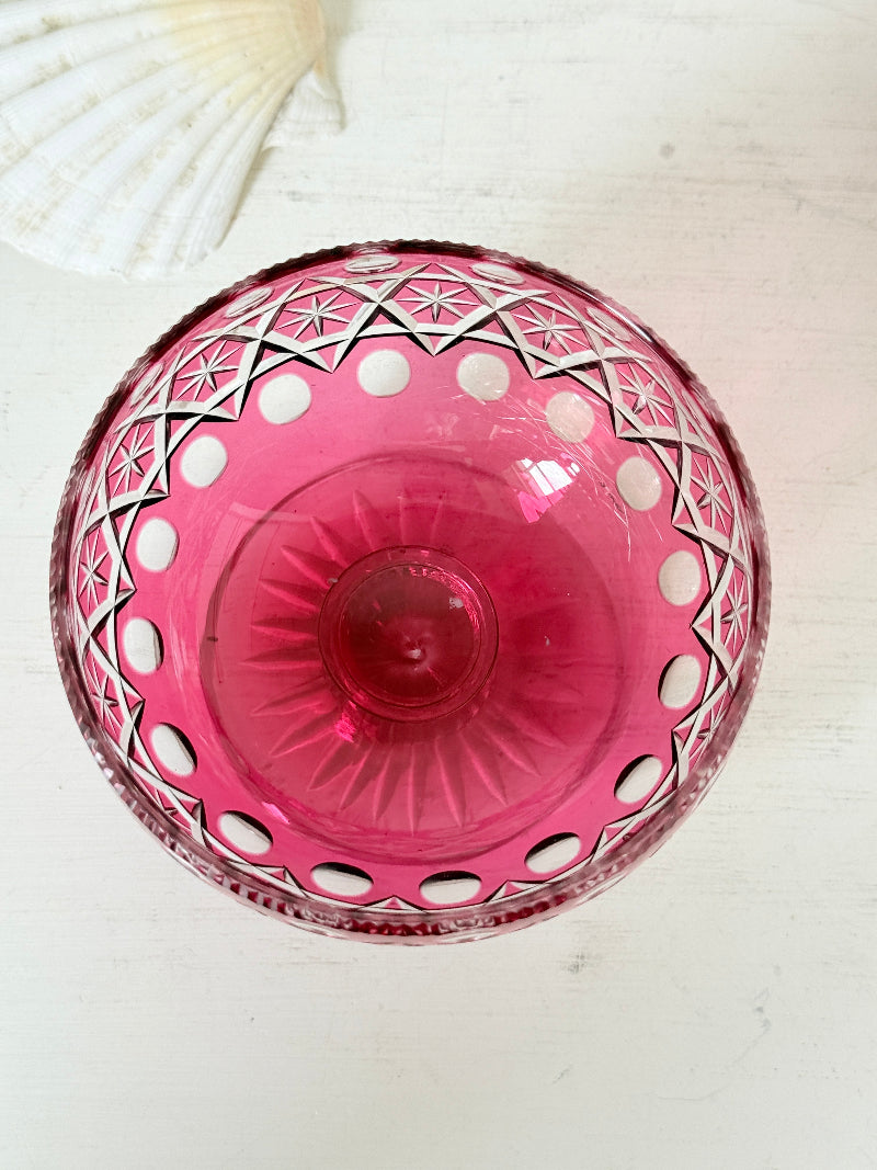 Antique cranberry cut to clear glass pedestal bowl with star and diamond pattern, clear foot and rich pink glass
