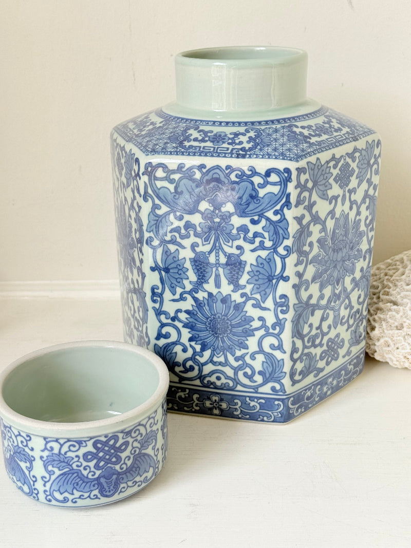 Blue and white floral ginger jar by Gisela Graham, photographed on a white surface