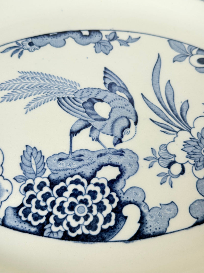 Vintage Woods and Sons Yuan blue and white serving platter photographed on a white surface