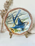 Vintage Puidgemont hand painted fishbowl with blue fish motif, photographed on a white surface