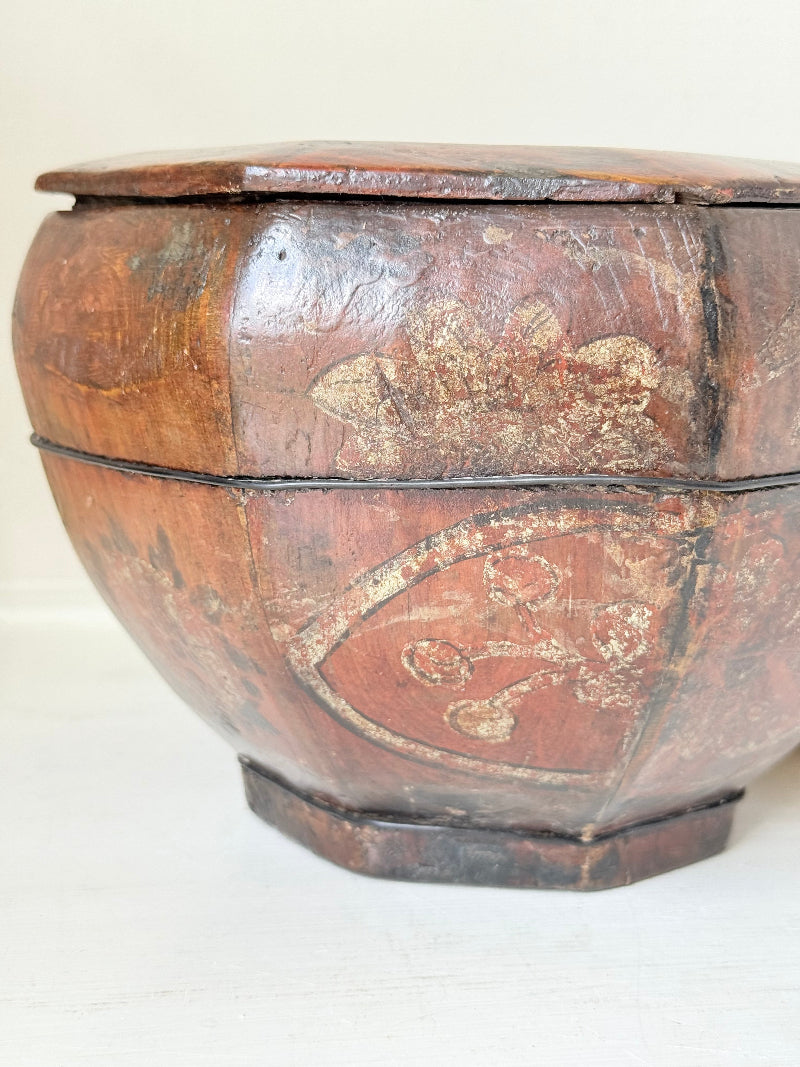 Antique octagonal Chinese lacquer basket with floral decoration and central figure, shown with lid on and off on a white surface