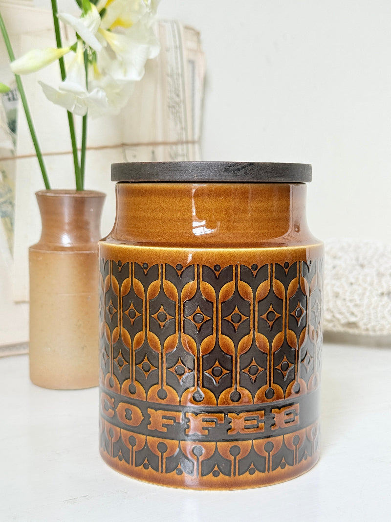 Hornsea Heirloom coffee storage jar in autumn brown stoneware with teak lid photographed on a white surface