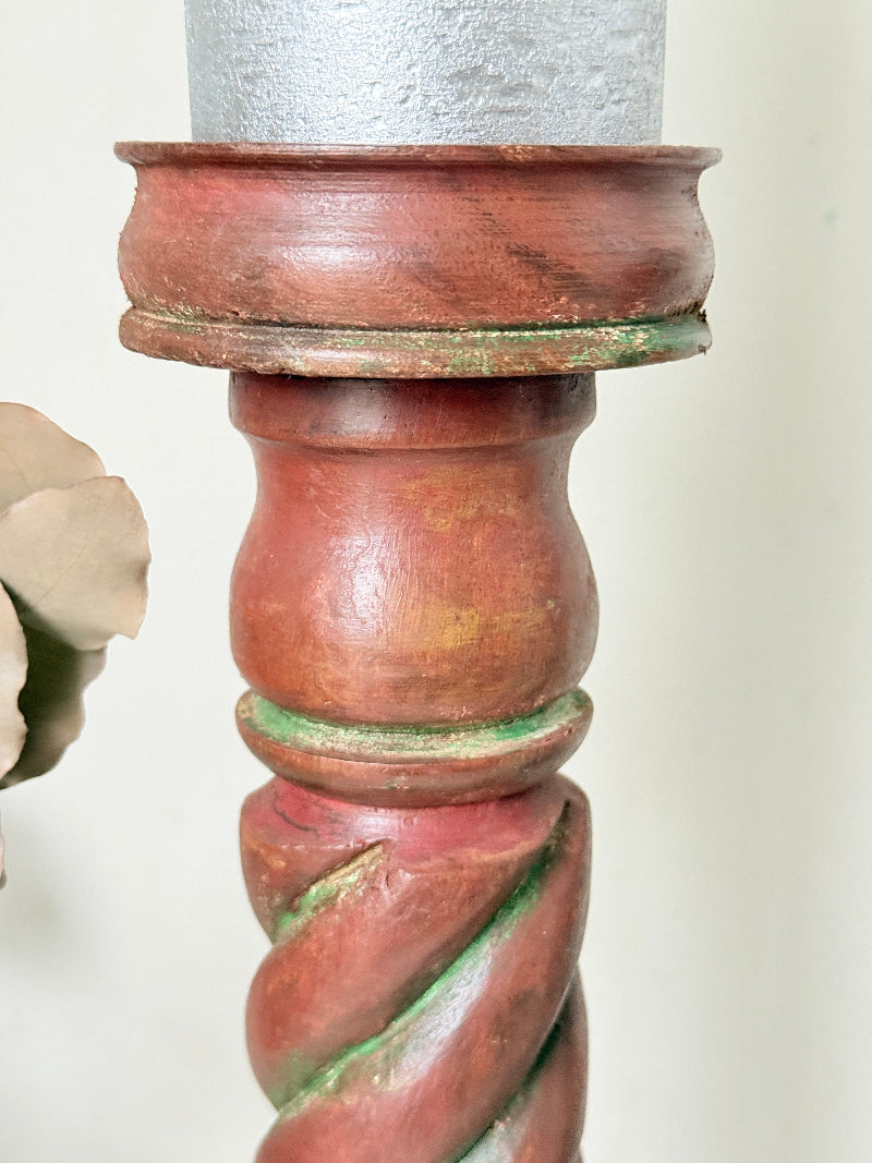 Vintage wooden barley twist candlesticks, a pair with painted finish, photographed on a white surface