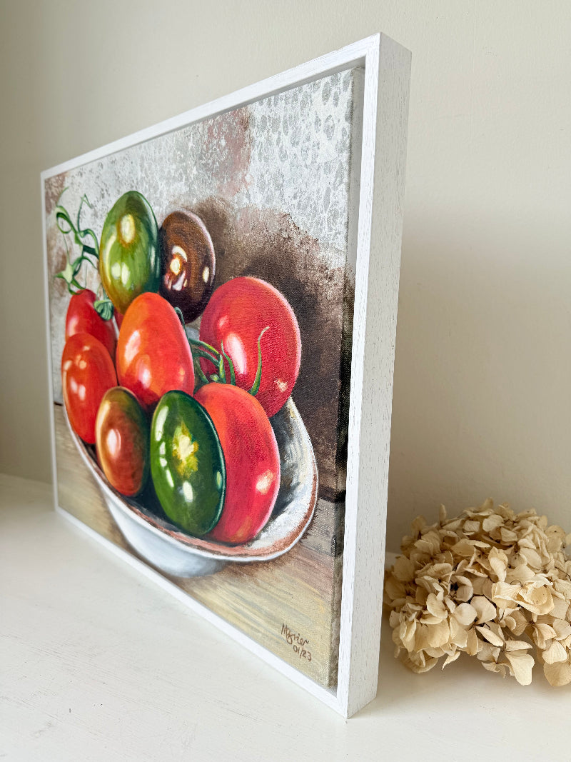 Original still life painting of tomatoes by M. Brier, 2021, framed in white box frame and photographed on white surface
