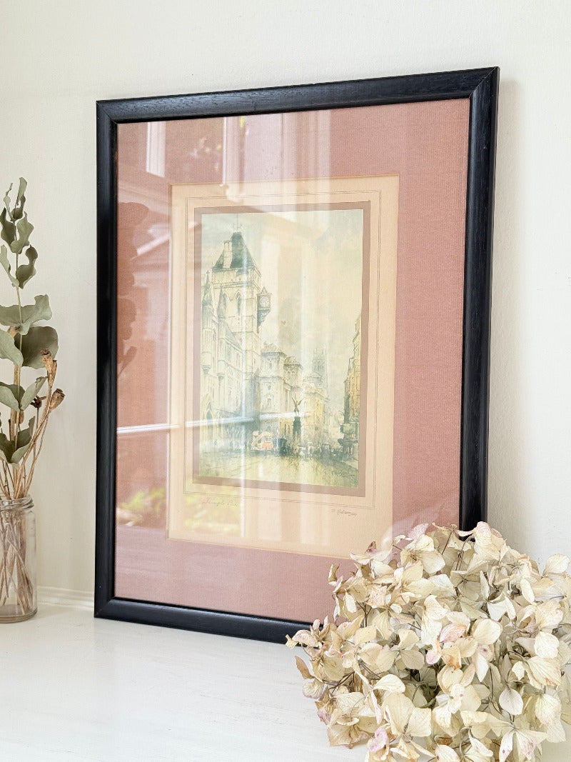 vintage framed print of temple bar watercolour by f robson in black frame with apricot and dusky pink mount on white surface