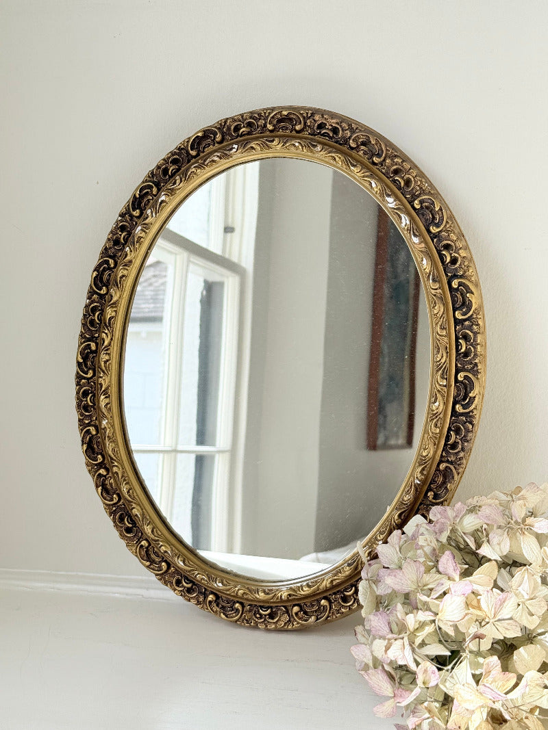 vintage gold oval mirror with ornate gilt painted frame