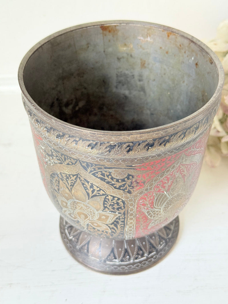 vintage indian lassi goblet with hand painted red and gold enamel motifs, styled with dried hydrangeas on a white surface