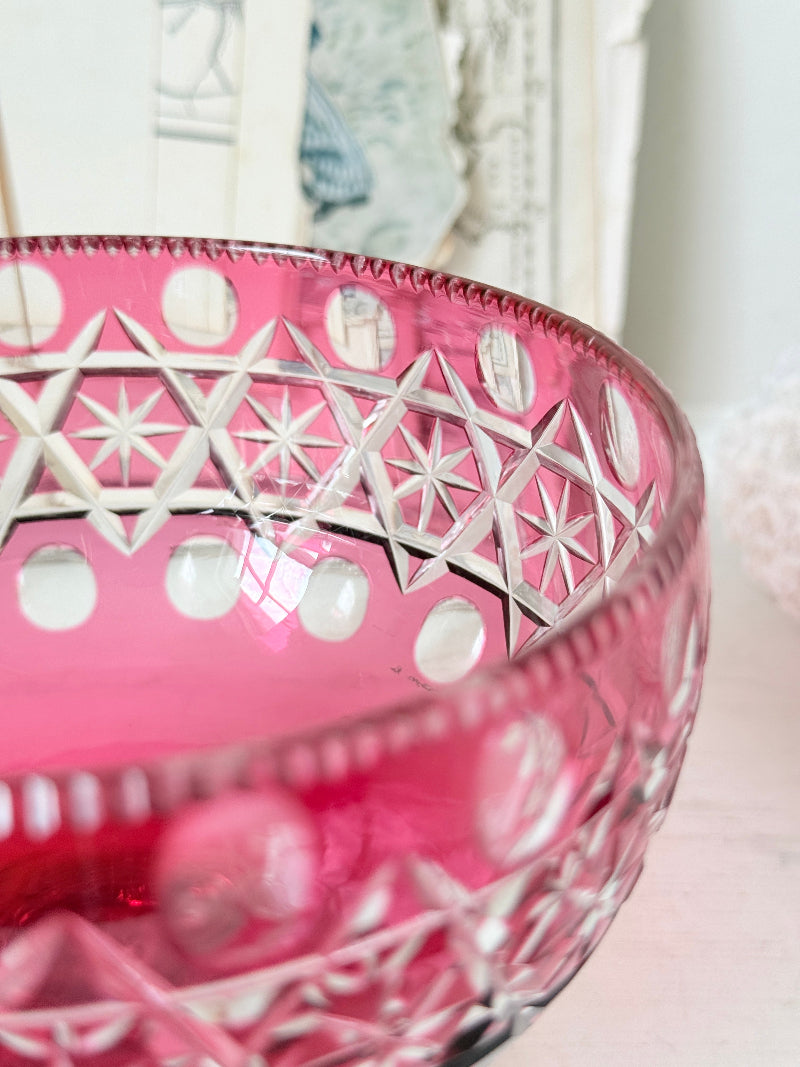 Antique cranberry cut to clear glass pedestal bowl with star and diamond pattern, clear foot and rich pink glass