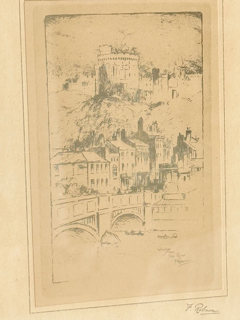 framed print of windsor castle viewed from the thames with fine line detail photographed on white surface
