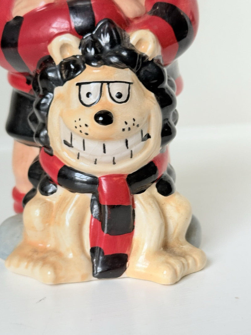 Dennis the Menace and Gnasher ceramic moneybox in red and black comic-style outfits, with vintage hand-painted detail.