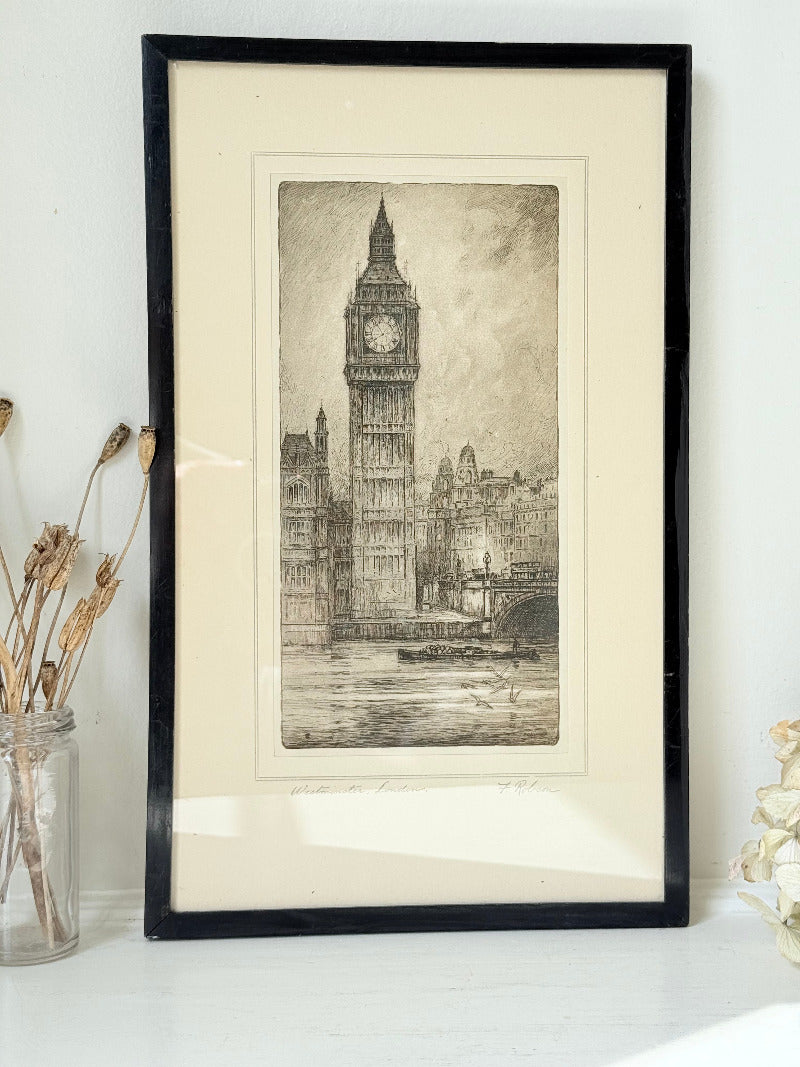 Vintage framed print of Big Ben in London, black frame, photographed on white surface with dried flowers