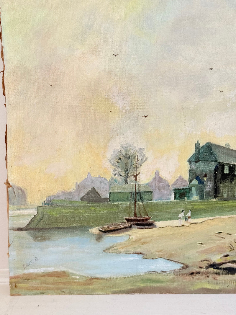 Vintage oil painting on board of a rural village scene with houses, trees, and water, photographed on a white surface