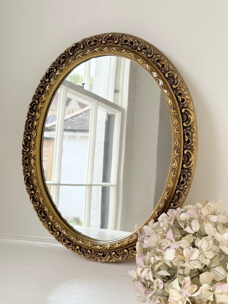 vintage gold oval mirror with ornate gilt painted frame