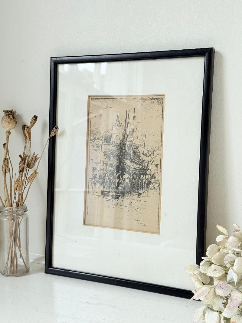 Vintage fishing harbour print in black frame, nautical scene wall art, styled on white surface with coastal decor accents