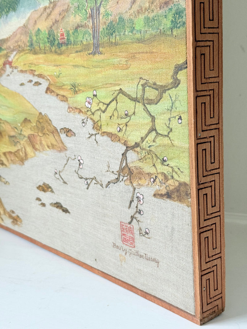 Vintage Chinese watercolour landscape on canvas with tree, mountains and blossom, photographed on white surface