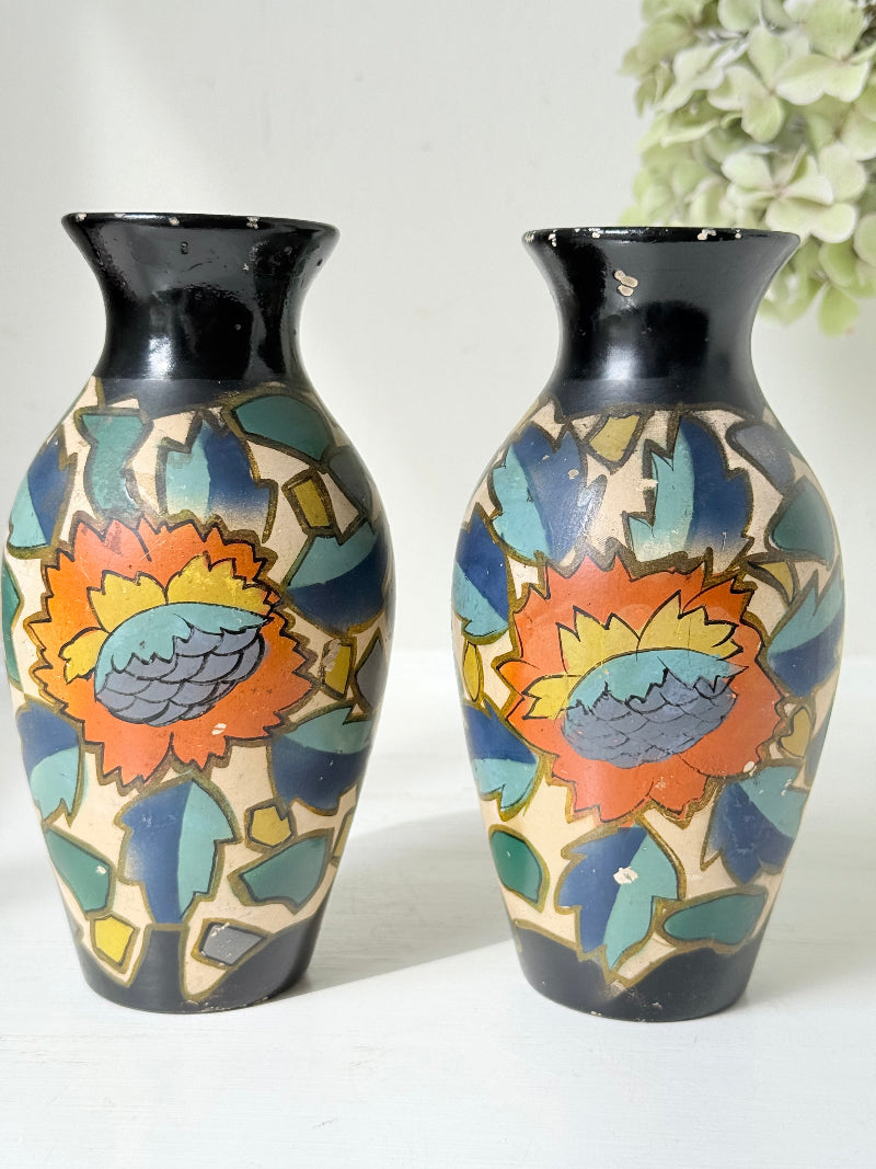 Pair of hand painted Brentleigh Ware Art Deco stoneware vases with bold floral design, photographed on a white surface