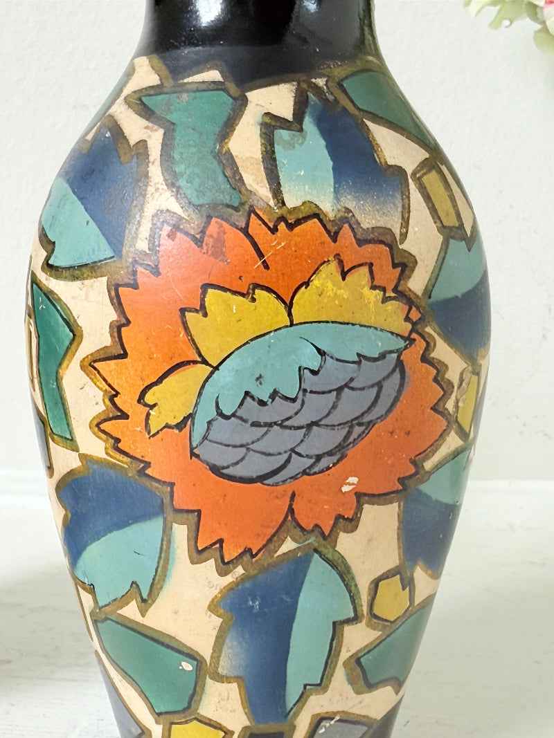 Pair of hand painted Brentleigh Ware Art Deco stoneware vases with bold floral design, photographed on a white surface