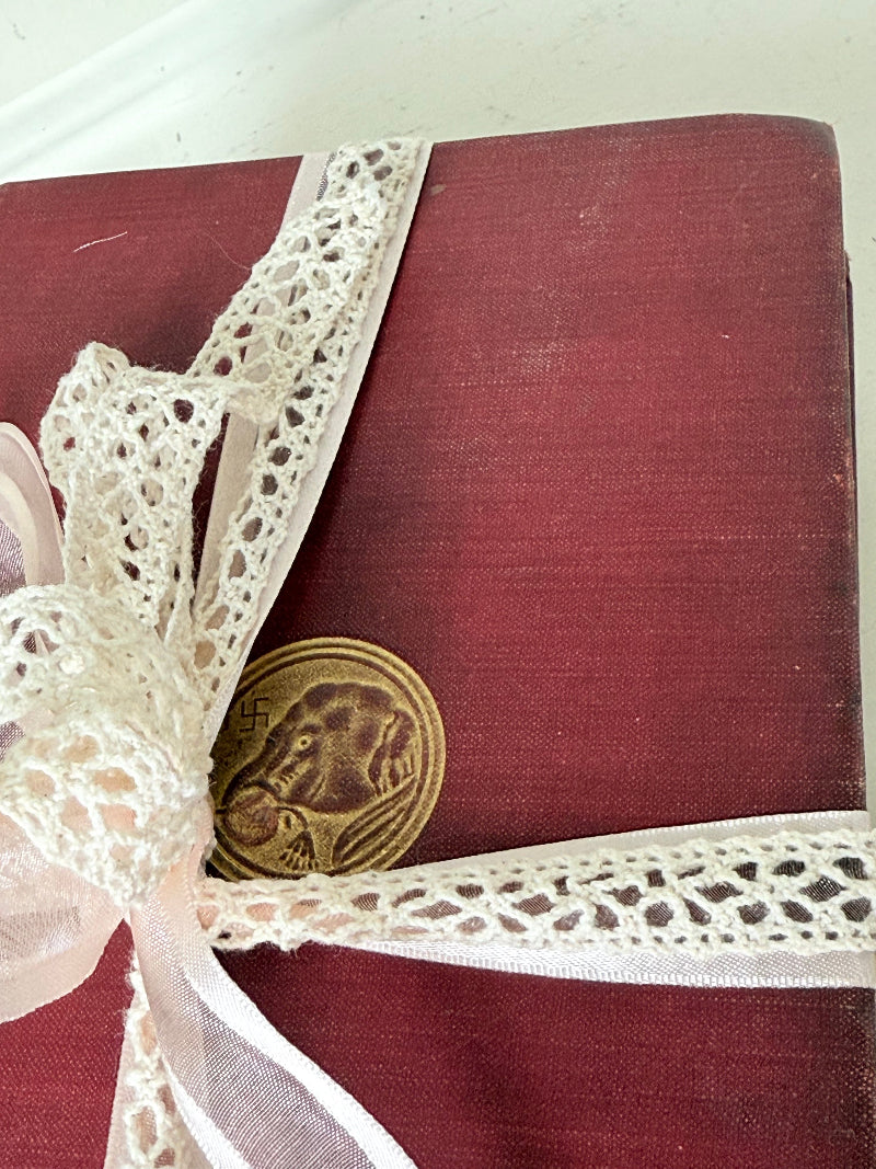 Vintage Rudyard Kipling book bundle of Kim and Many Inventions in red hardback covers, photographed on a white surface