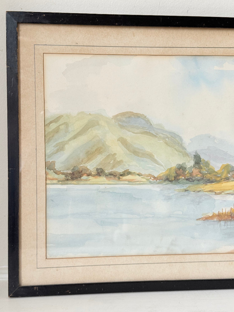 Vintage signed watercolour landscape of mountains and lake in black frame