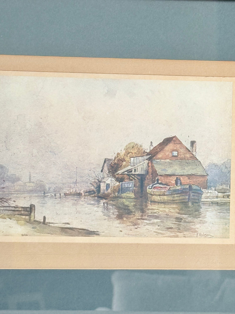 Vintage framed print of riverside mill by F Robson, gilt frame with blue mount, rustic water scene, photographed on white surface.