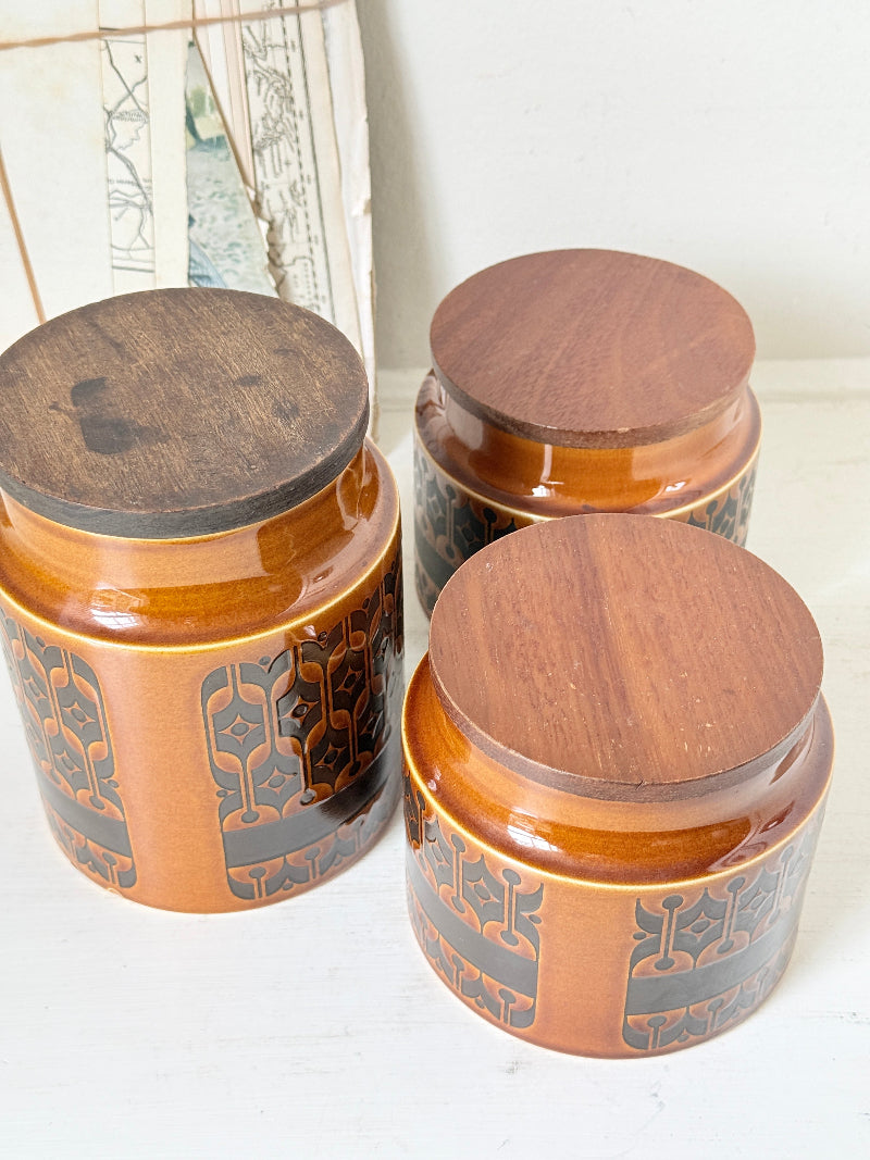 Hornsea Heirloom coffee tea and sugar canister set in autumn brown stoneware with teak lids photographed on a white surface