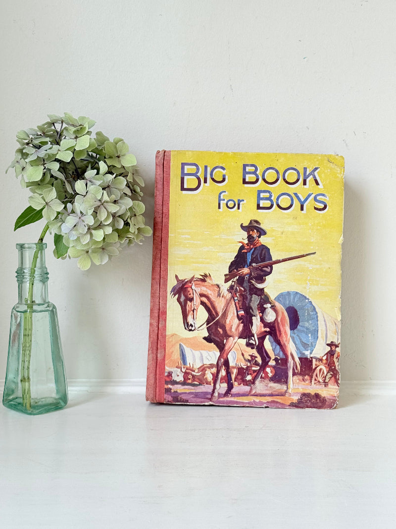 Vintage Big Book for Boys annual with illustrated cover and inscription dated 1941, photographed on a white surface