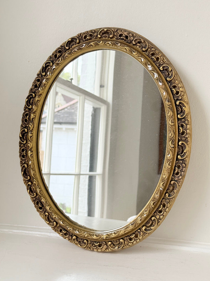 vintage gold oval mirror with ornate gilt painted frame