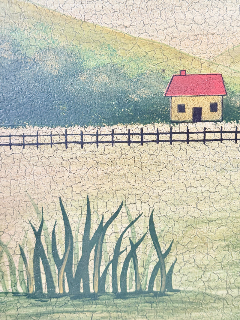 A textured, crackled painting of a rural landscape featuring a small house with a red roof, a fence, green reeds in the foreground, and a grassy hill in the background.