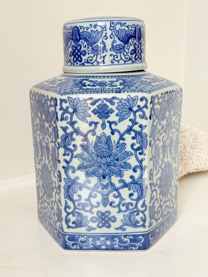 Blue and white floral ginger jar by Gisela Graham, photographed on a white surface