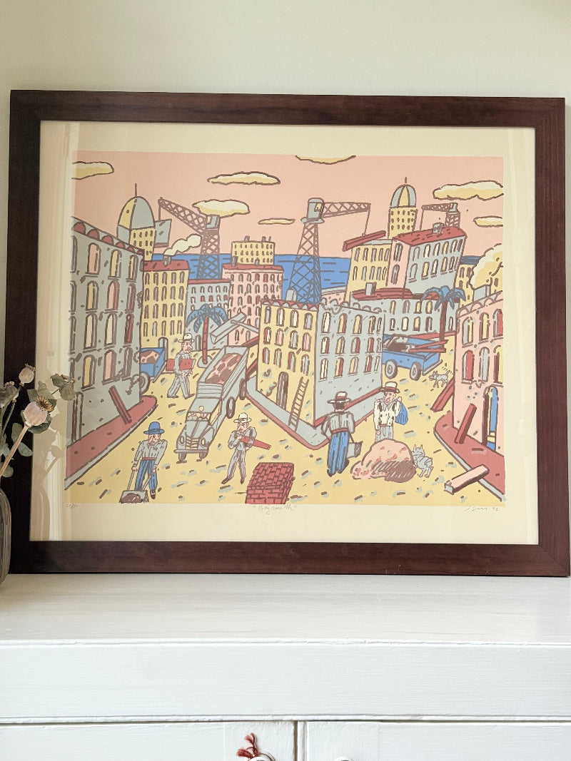 Limited edition screen print of Beirut by Antonio Segui in a wooden frame, signed and dated 1995, photographed on a white surface