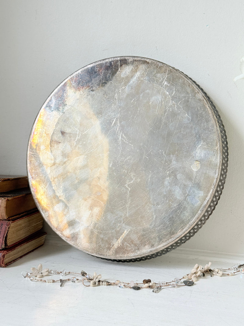 Vintage round silver plated gallery tray with pierced rim, engraved centre and aged patina for drinks or vanity styling