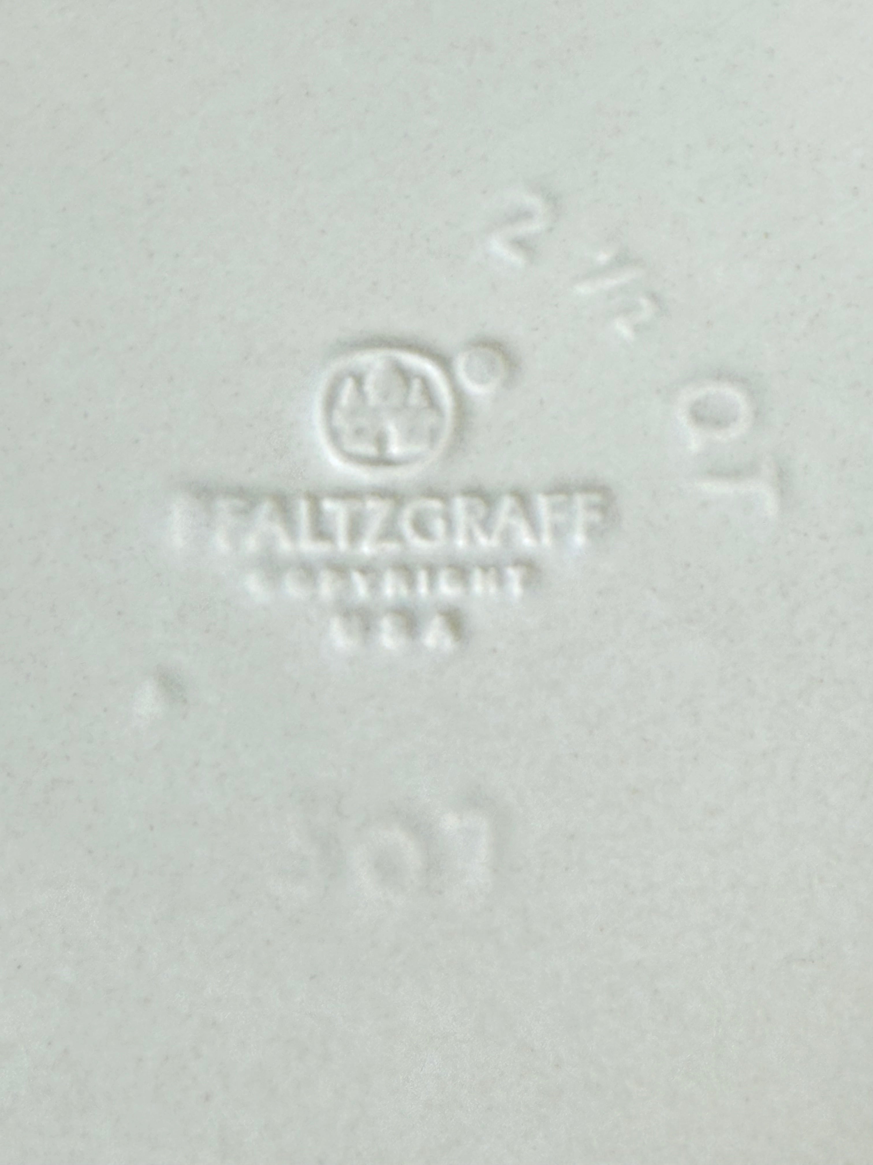 Pfaltzgraff Yorktowne stoneware sugar jar with blue floral motif and lid, photographed on a white surface