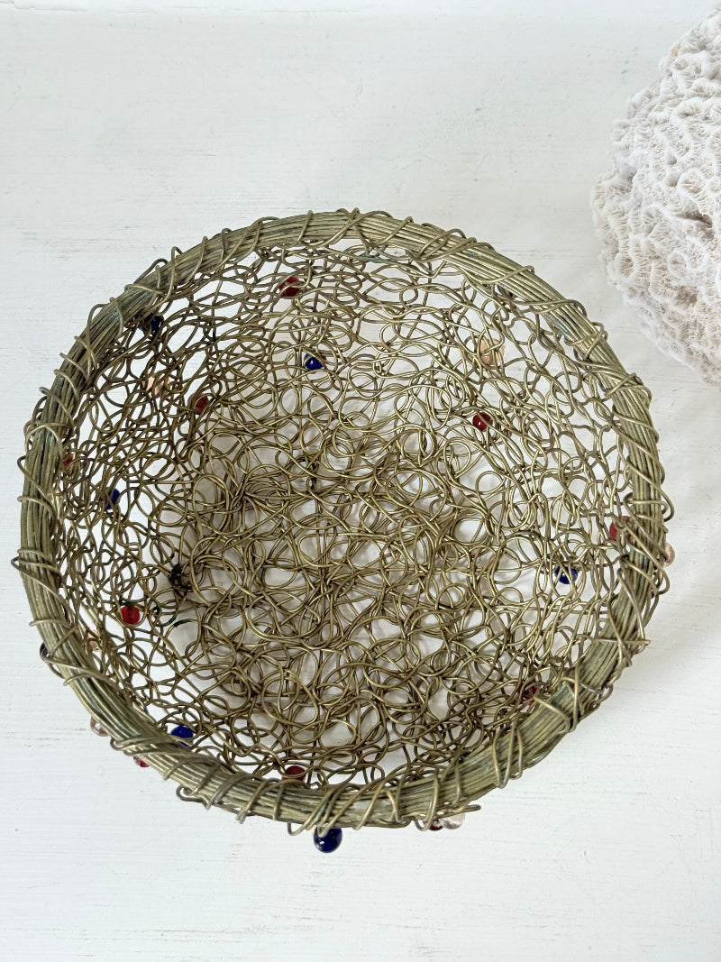 Vintage brass wire basket with coloured glass beads, photographed from multiple angles on a white surface