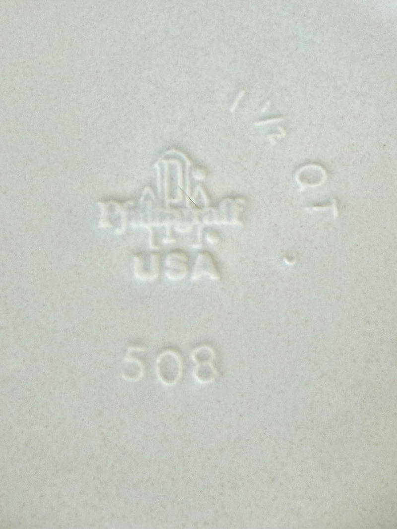 Pfaltzgraff Yorktowne stoneware coffee jar with blue floral motif and lid, photographed on a white surface