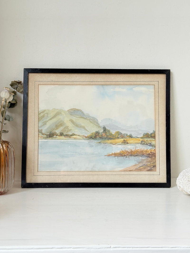 Vintage signed watercolour landscape of mountains and lake in black frame