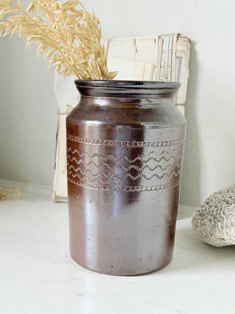 Vintage glazed stoneware pot with treacle brown glaze, incised banded decoration and wide rim for kitchen or shelf styling
