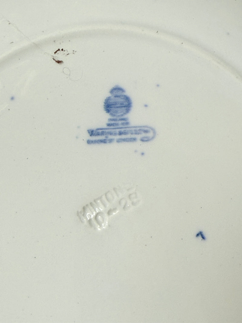 Minton Blue Willow serving dish dated 1928 with blue transfer pattern shown on a white surface.