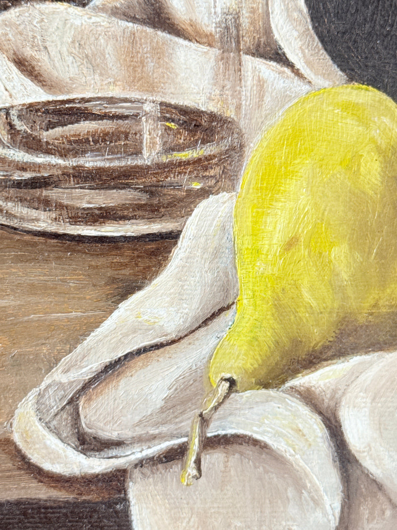 Still life oil painting featuring a bright yellow pear resting on draped white fabric, with a dark brown bowl in the background.