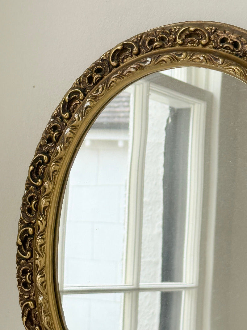 vintage gold oval mirror with ornate gilt painted frame