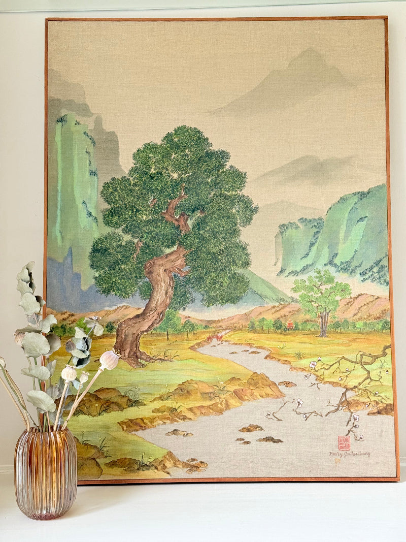 Vintage Chinese watercolour landscape on canvas with tree, mountains and blossom, photographed on white surface