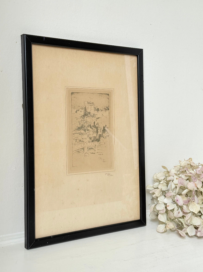 framed print of windsor castle viewed from the thames with fine line detail photographed on white surface
