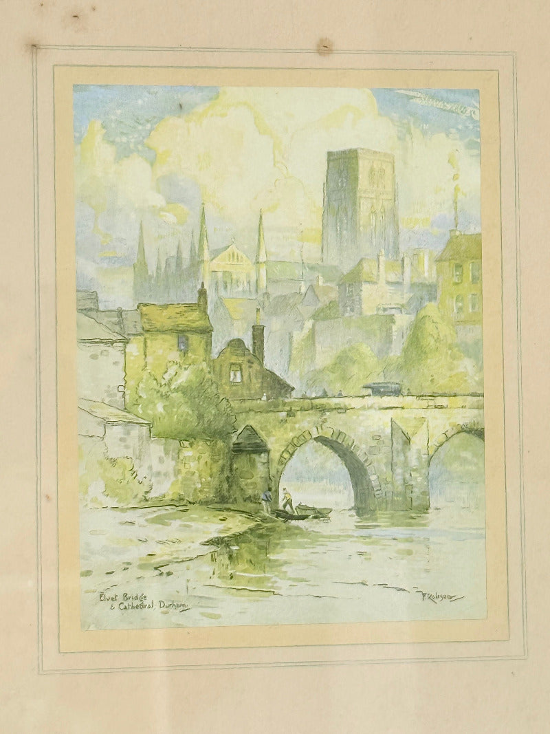 framed print of durham cathedral and elvet bridge with soft green and yellow tones photographed on white surface