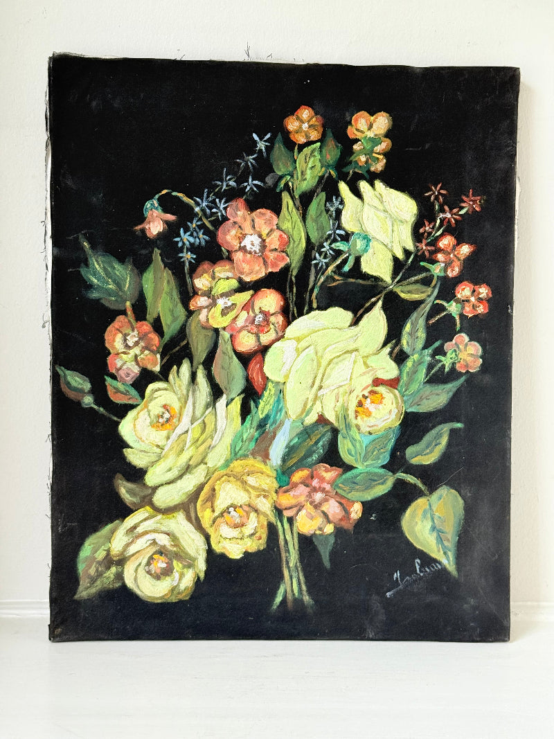 Vintage floral still life oil on canvas with yellow and peach blooms against dark background, unframed, on white surface.