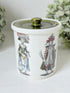 vintage holkham pottery condiment pot with green lid and illustrated figures photographed on white surface