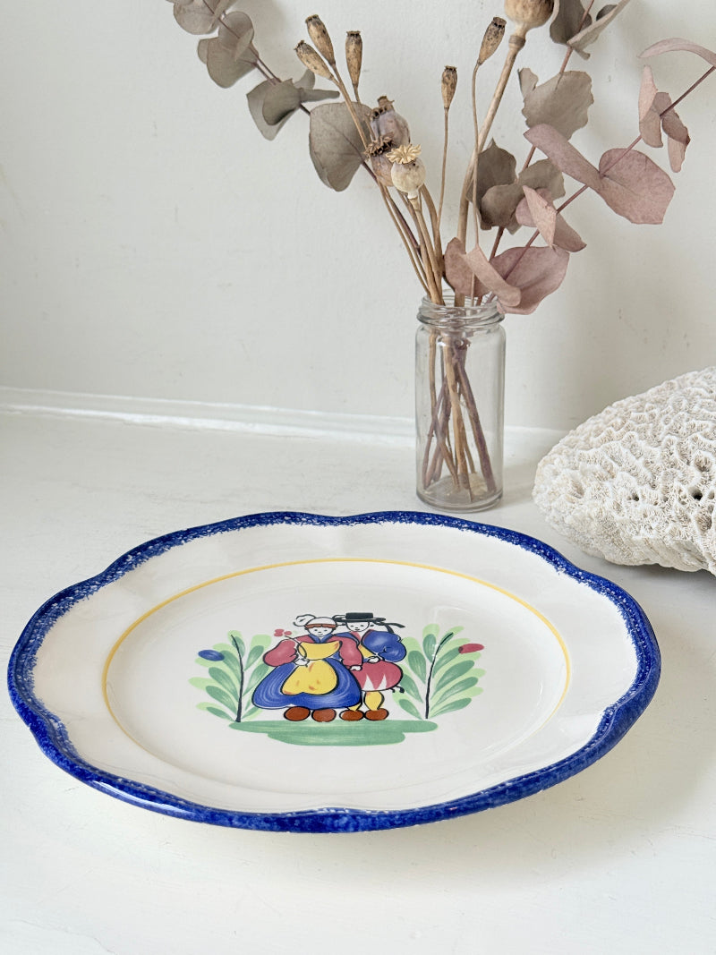 Vintage French ceramic serving plate by Faïencerie de Pornic with Quimper style Breton couple design and blue scalloped rim