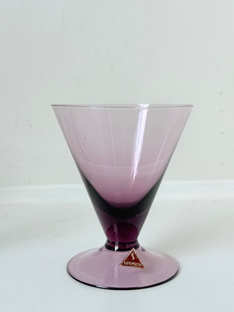 Set of five mid century German martini glasses in coloured glass with ombré effect, photographed on a white surface